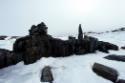Inuksuit on a small island at Itilliarjuk.
Southwest Baffin Island, Nunavut, 1995

The Norma…