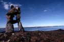 Niungvaliruluit (a window-shaped directional inuksuk for sighting or aligning a location in the…